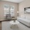 a living room with a tv and couches