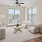 a living room with a fan