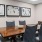 a business lounge and table with chairs
