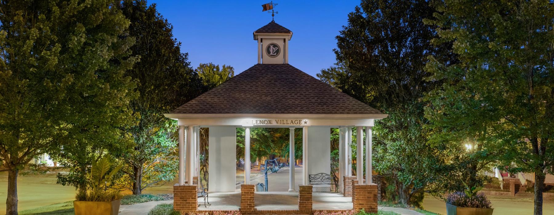 a small gazebo with trees