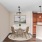 a dining room with a table and chairs