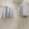 a closet with clothing