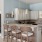 a kitchen with white cabinets