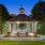 a small gazebo with trees