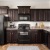 a kitchen with black appliances